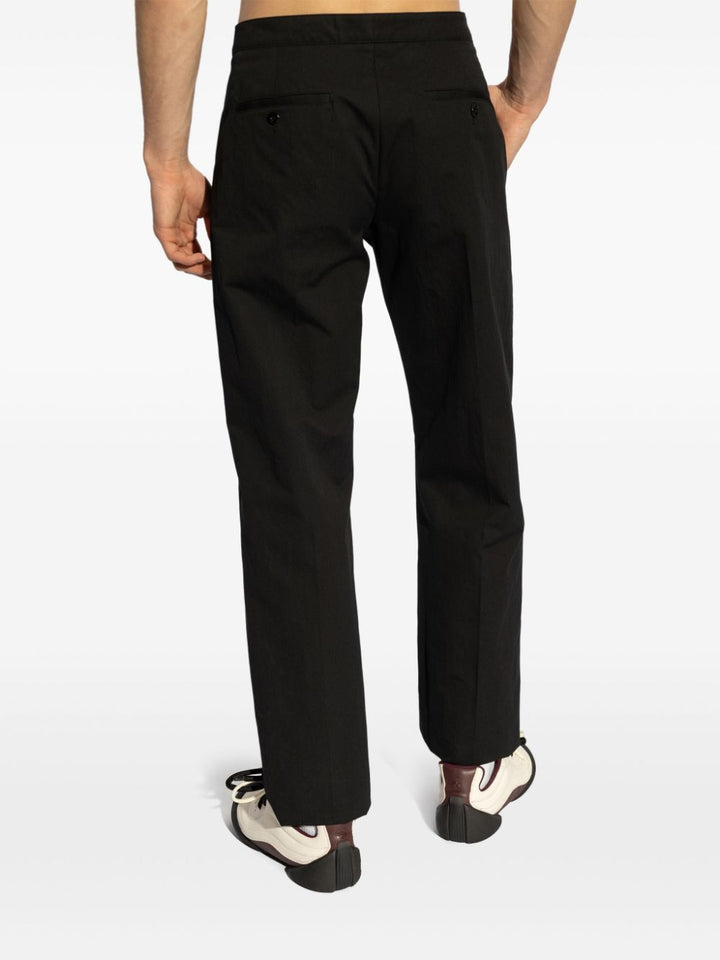 ALEXANDER MCQUEEN - Men's Arrow Belt Trousers in Black - Lothaire