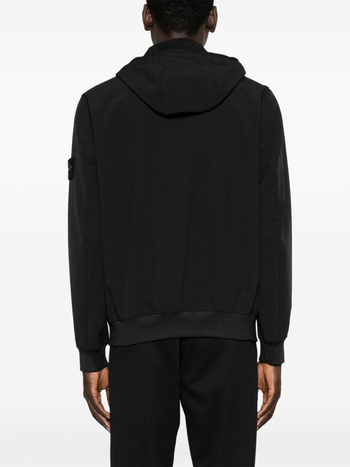 Stone Island veste zippée noir en soft shell à logo Compass - Lothaire