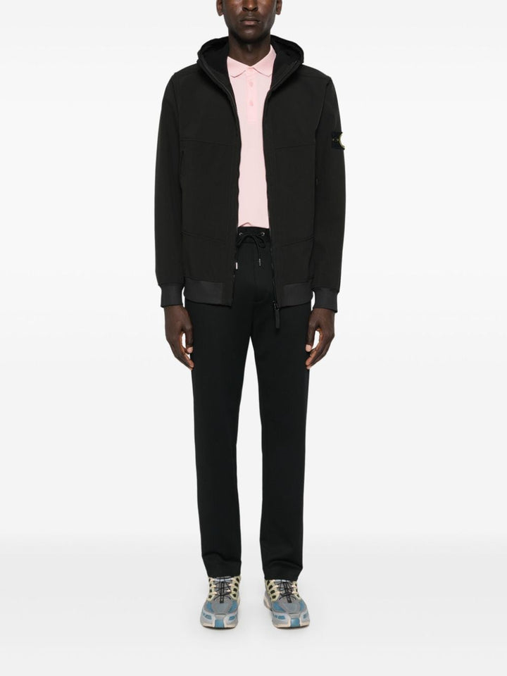 Stone Island veste zippée noir en soft shell à logo Compass - Lothaire