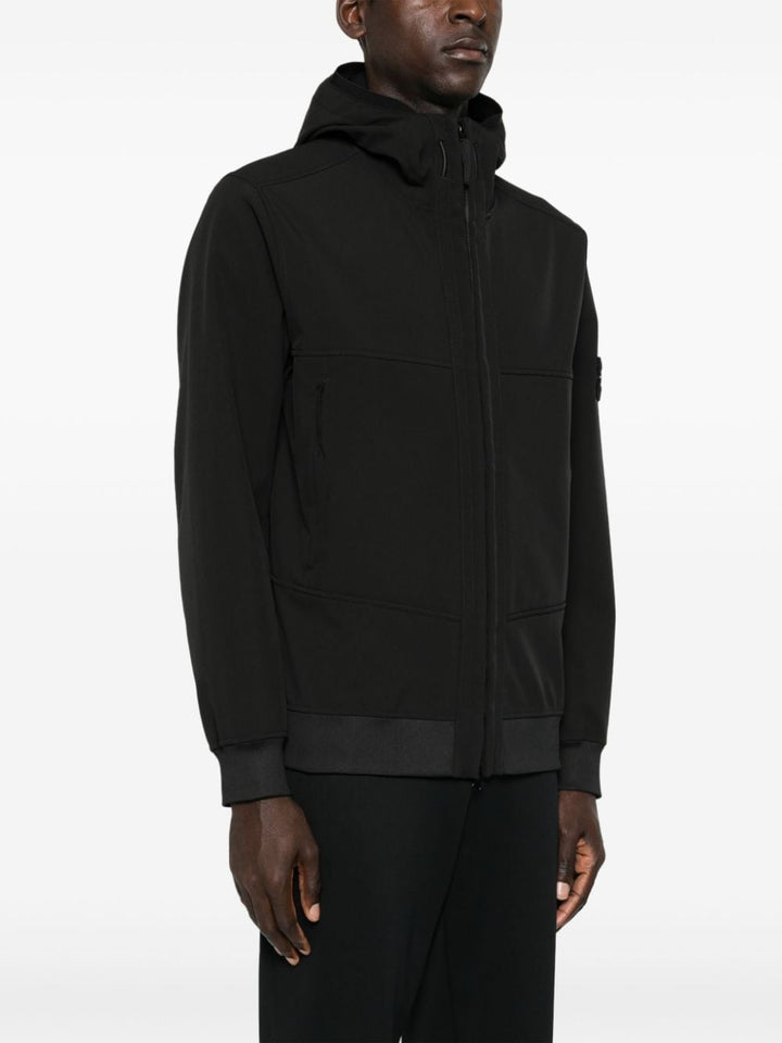 Stone Island veste zippée noir en soft shell à logo Compass - Lothaire