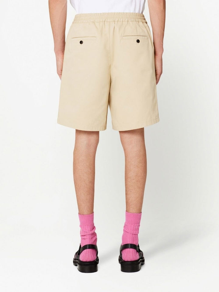 AMI Paris Short de sport beige - Lothaire