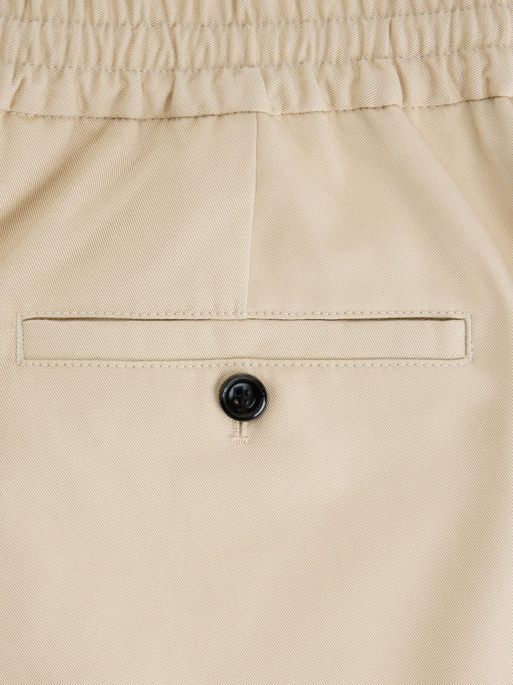 AMI Paris Short de sport beige - Lothaire