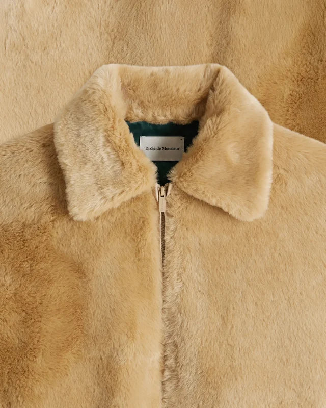 DRÔLE DE MONSIEUR - Veste en fausse fourrure Slogan Beige