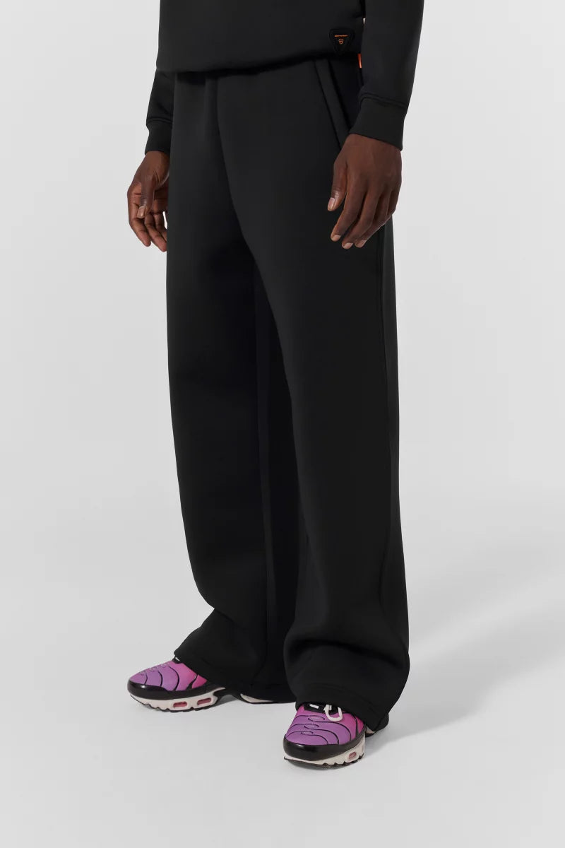 GERTRUDE - Pantalon Cardi en maille scuba coupe ample Noir