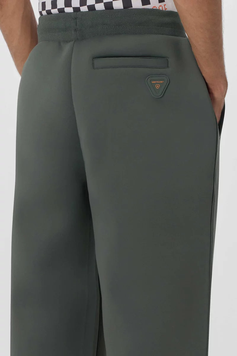 GERTRUDE - Pantalon Cardi en maille scuba coupe ample Vert