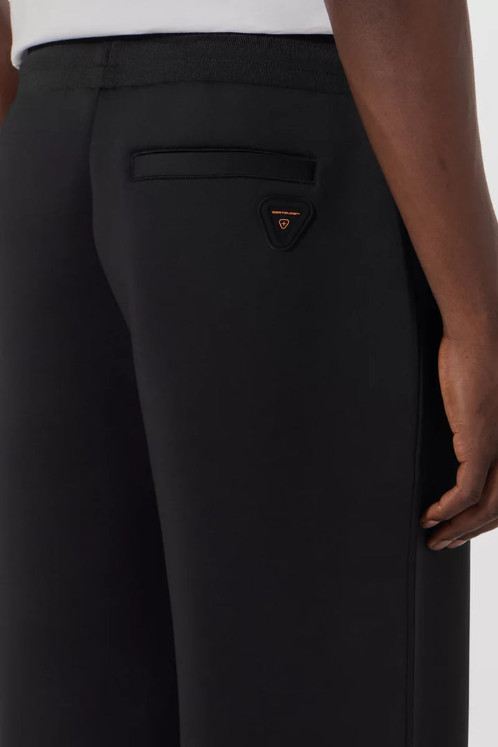 GERTRUDE - Pantalon Cardi en maille scuba coupe ample Noir
