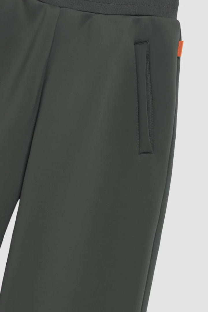GERTRUDE - Pantalon Cardi en maille scuba coupe ample Vert