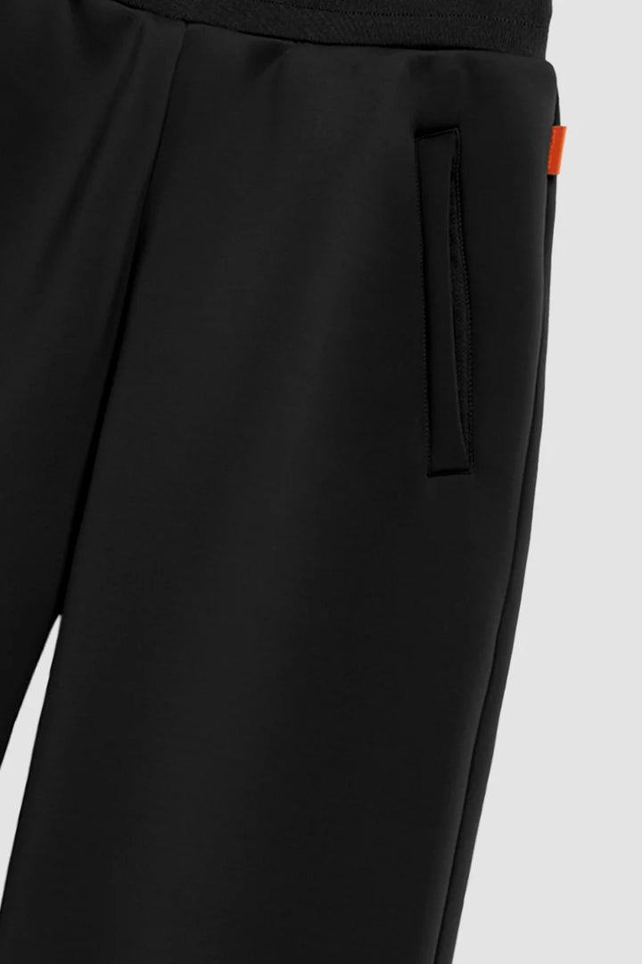 GERTRUDE - Pantalon Cardi en maille scuba coupe ample Noir