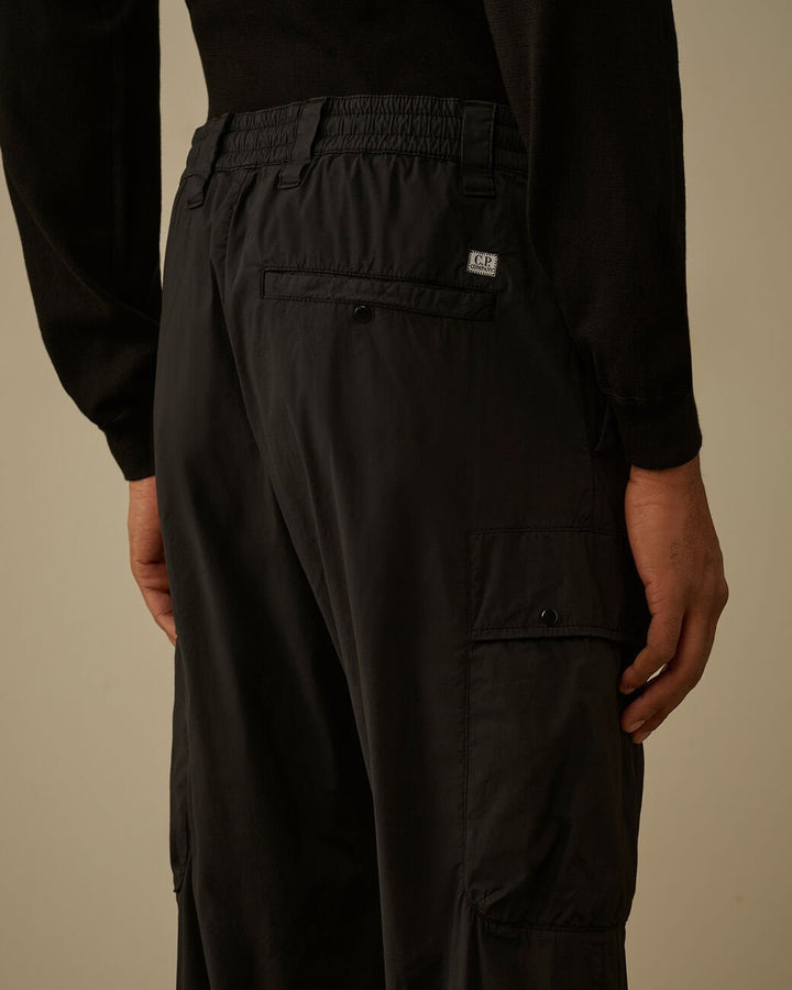 C.P. COMPANY - 50 Fili Stretch Elasticated Lens Cargo Pants Noir - Lothaire