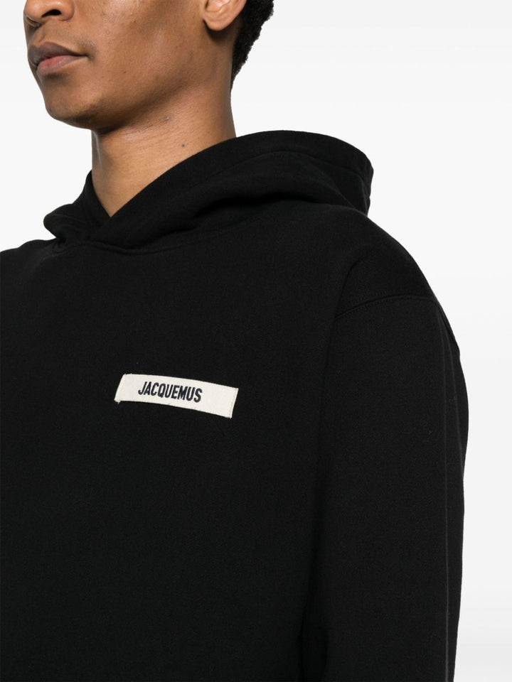 Jacquemus Le hoodie noir avec patch logo en gros grain - Lothaire