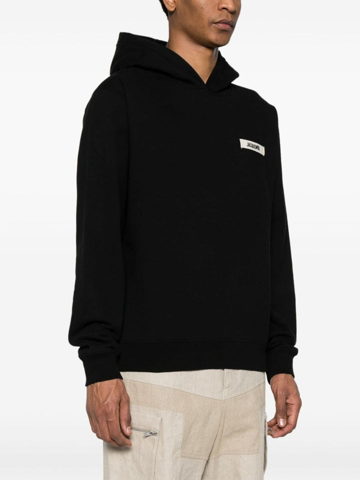 Jacquemus Le hoodie noir avec patch logo en gros grain - Lothaire