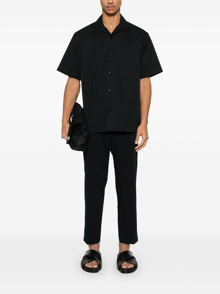JIL SANDER - pantalon à coupe fuselée bleu marine - Lothaire