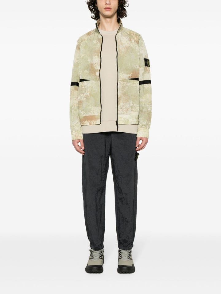 STONE ISLAND DISSOLVING GRID CAMO ON ECONYL® REGENERATED NYLON WITH PRIMALOFT® INSULATION TECHNOLOGY - Lothaire