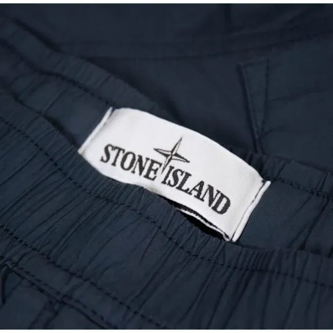 STONE ISLAND - Pantalon cargo coupe fuselée regular à poches zippées PARACADUTE Bleu - Lothaire