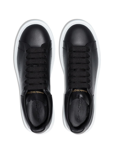 Alexander McQueen Baskets oversized en cuir noir/noir - Lothaire boutiques