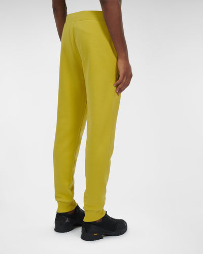 CP Company Pantalon de jogging Diagonal Raised Fleece Golden Palm - Lothaire boutiques