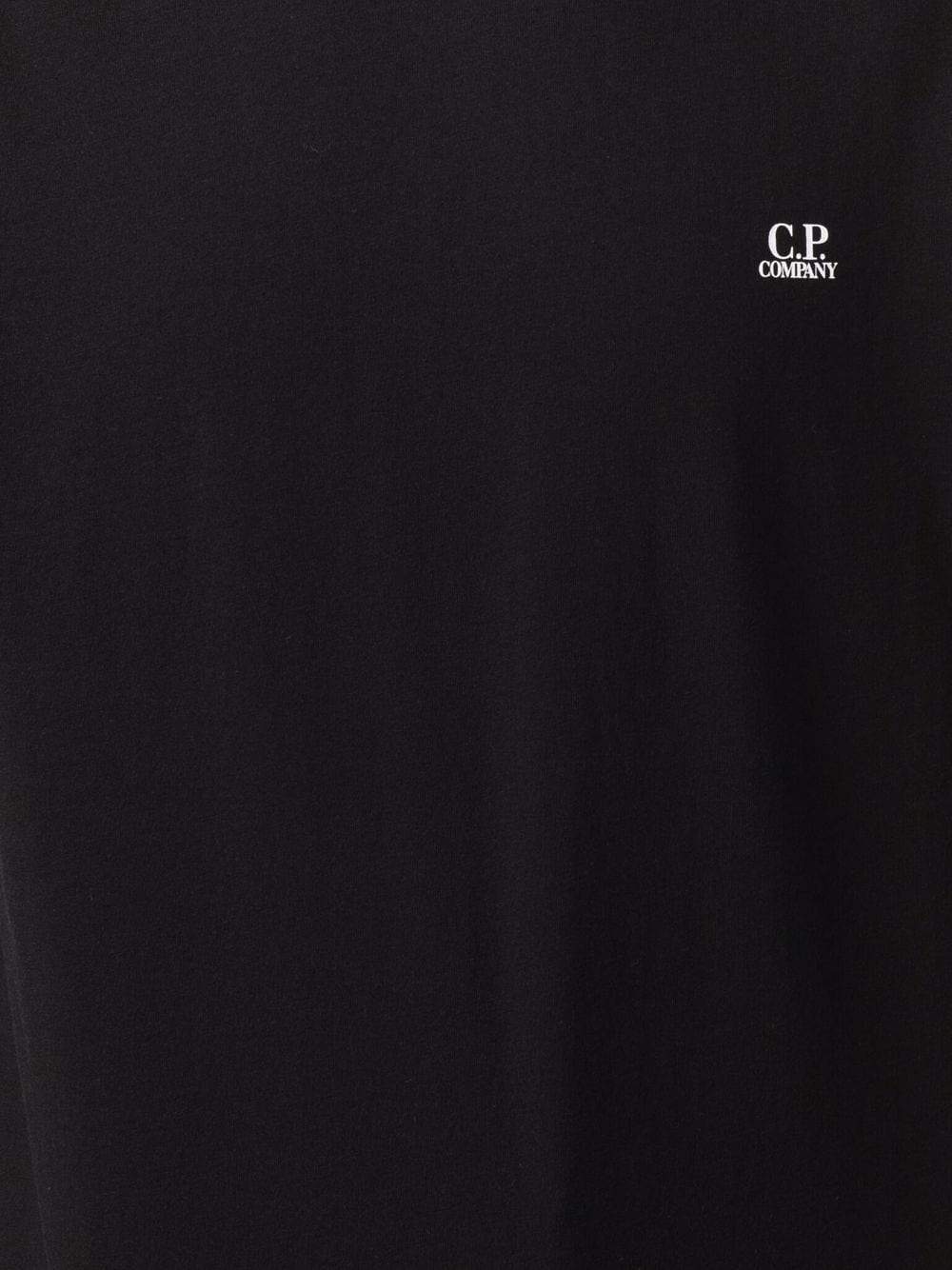 C.P Company t-shirt à imprimé graphique au dos noir/sun desert - Lothaire boutiques (6932359839909)