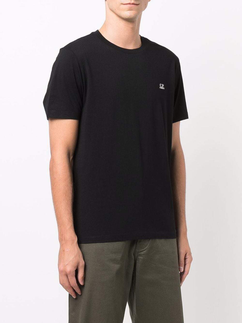 C.P Company t-shirt à imprimé graphique au dos noir/sun desert - Lothaire boutiques (6932359839909)