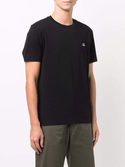 C.P Company t-shirt à imprimé graphique au dos noir/sun desert - Lothaire boutiques (6932359839909)
