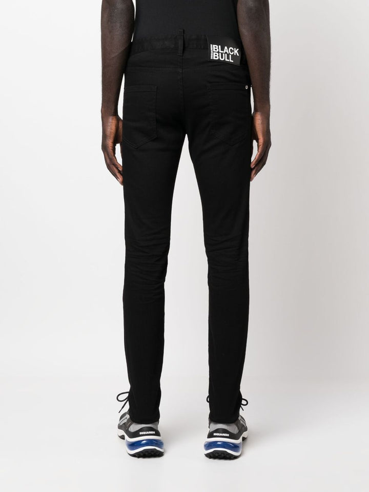 Dsquared2 Jean brut noir slim à patch logo - Lothaire