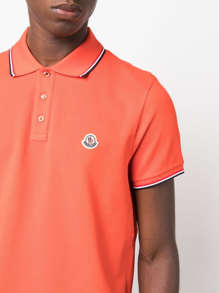 Moncler Polo rayé en coton à patch logo orange - Lothaire