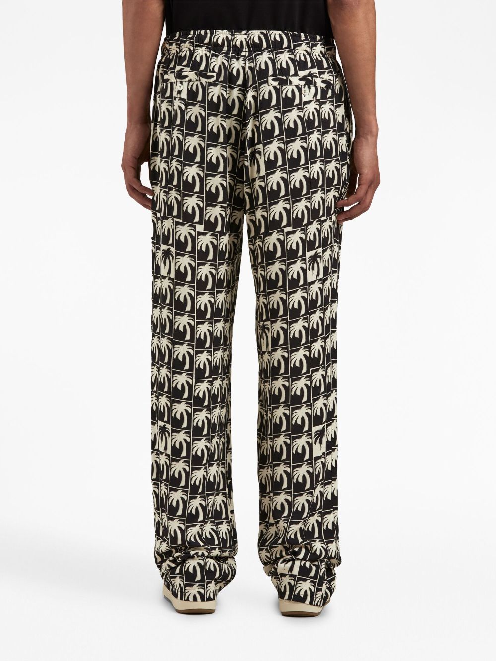 Palm Angels Pantalon ample à imprimé palmier - Lothaire