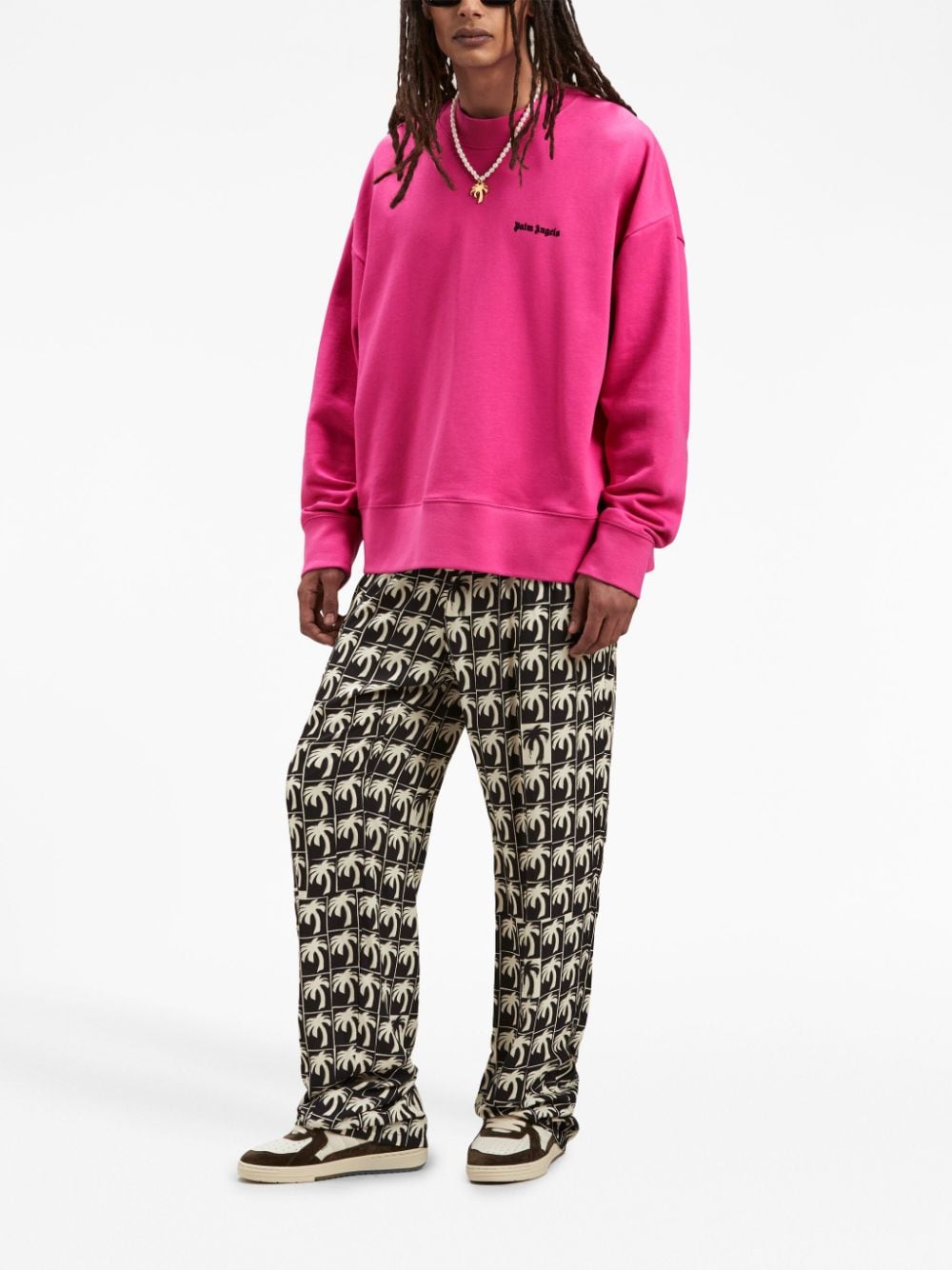 Palm Angels Pantalon ample à imprimé palmier - Lothaire