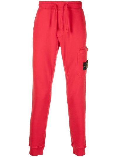 Stone Island Pantalon de jogging rouge fuselé à patch compass - Lothaire boutiques