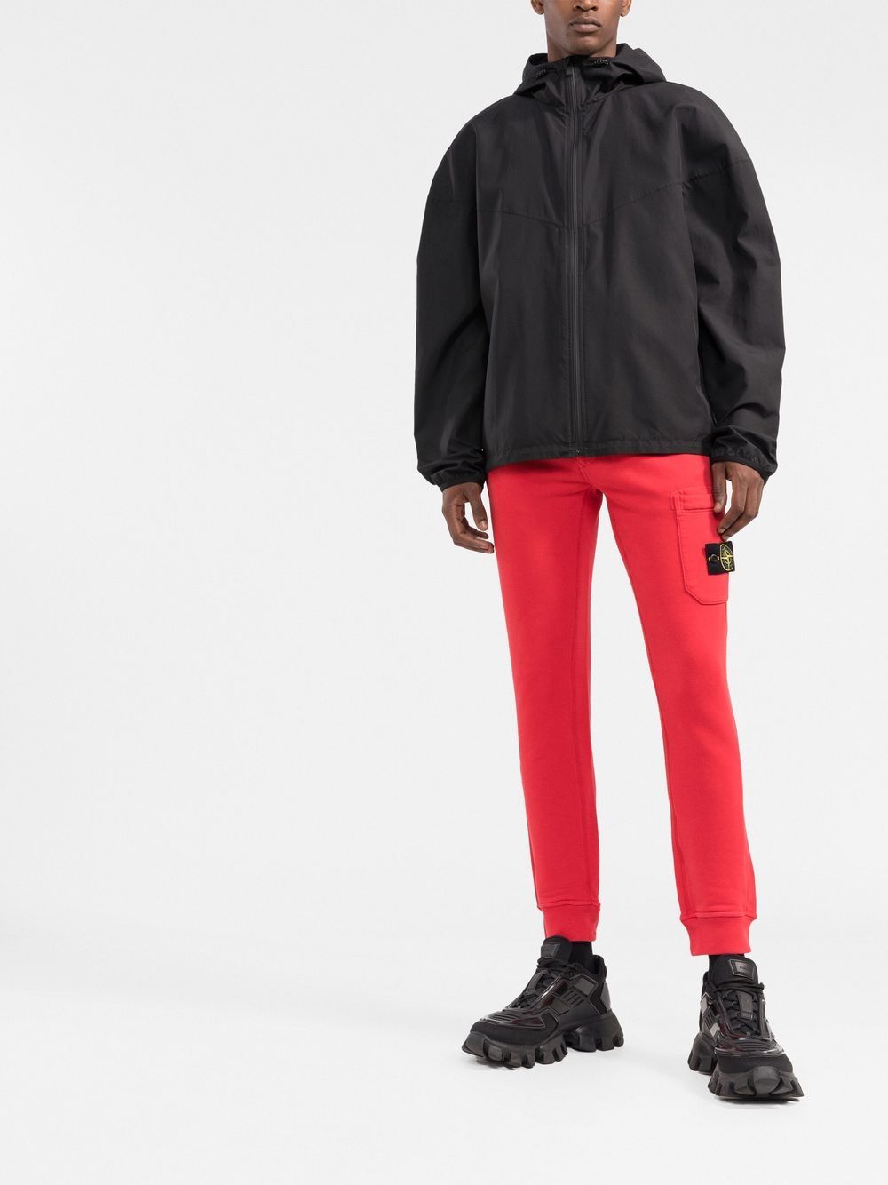 Stone Island Pantalon de jogging rouge fuselé à patch compass - Lothaire boutiques